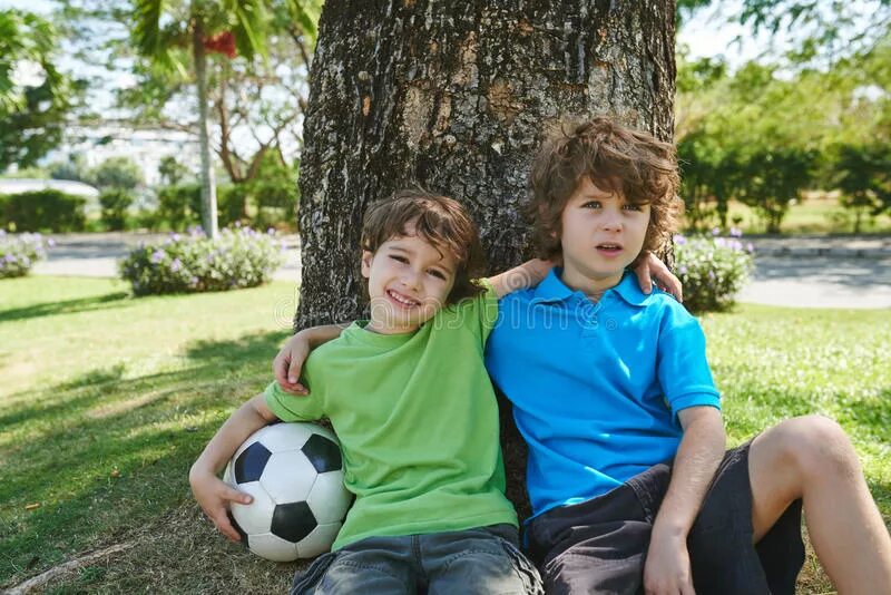 My brother plays football. Brother Play Football. My brother (Play )Football with his.