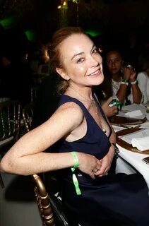 Lindsay Lohan suffers unfortunate nip slip before partying with unlikely pa...