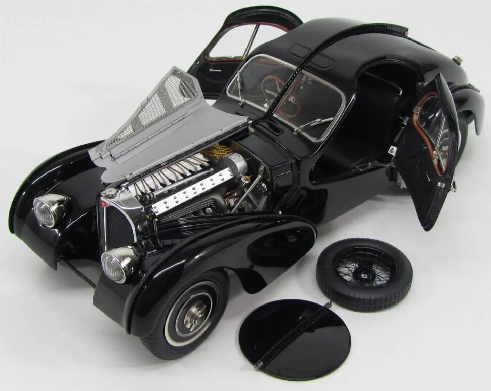 Автомобили 1 18 купить. Bugatti 57 SC Atlantic 1/18 MINICHAMPS. Bugatti Type 57sc Atlantic. Bugatti Type 57sc, 1938. Bugatti 57sc модель автомобиля 1 18.