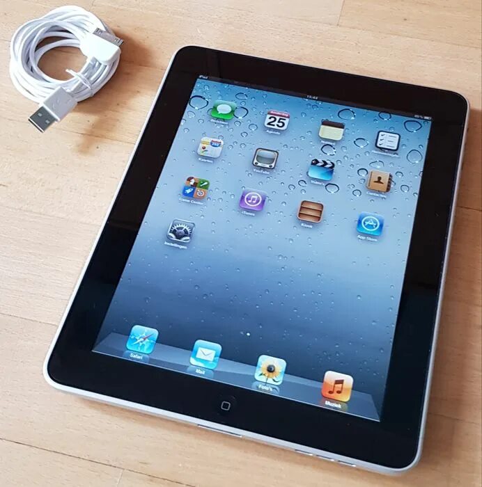 Купить планшет 120. IPAD a1219. Apple IPAD 2010. Планшет айпад. IPAD 1.