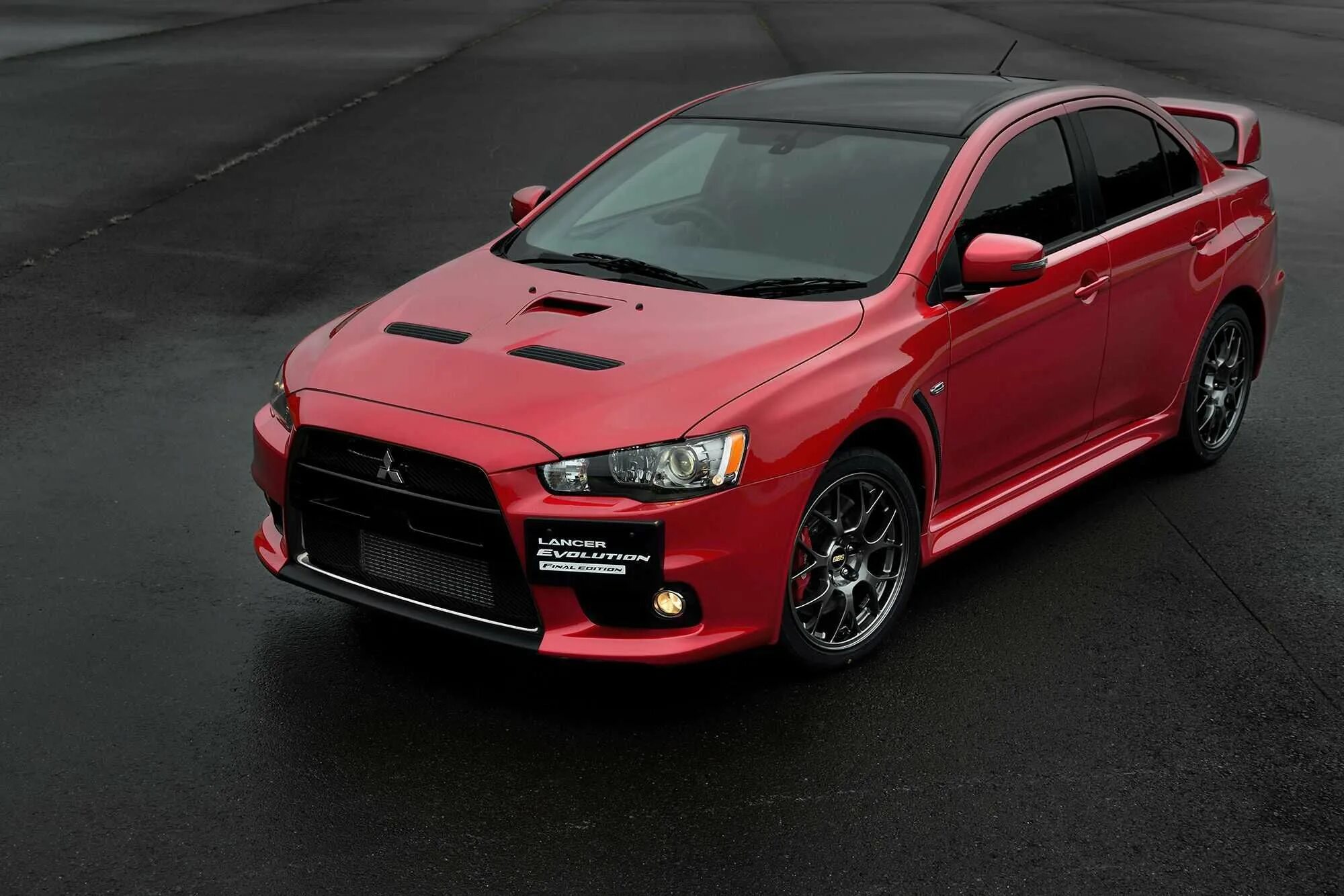 Эва митсубиси. Mitsubishi Lancer Evolution 10. Митсубиси Лансер 10 EVO. Митсубиси Лансер Эволюшн 10 красный. Mitsubishi Lancer Evolution 10 Final Edition.