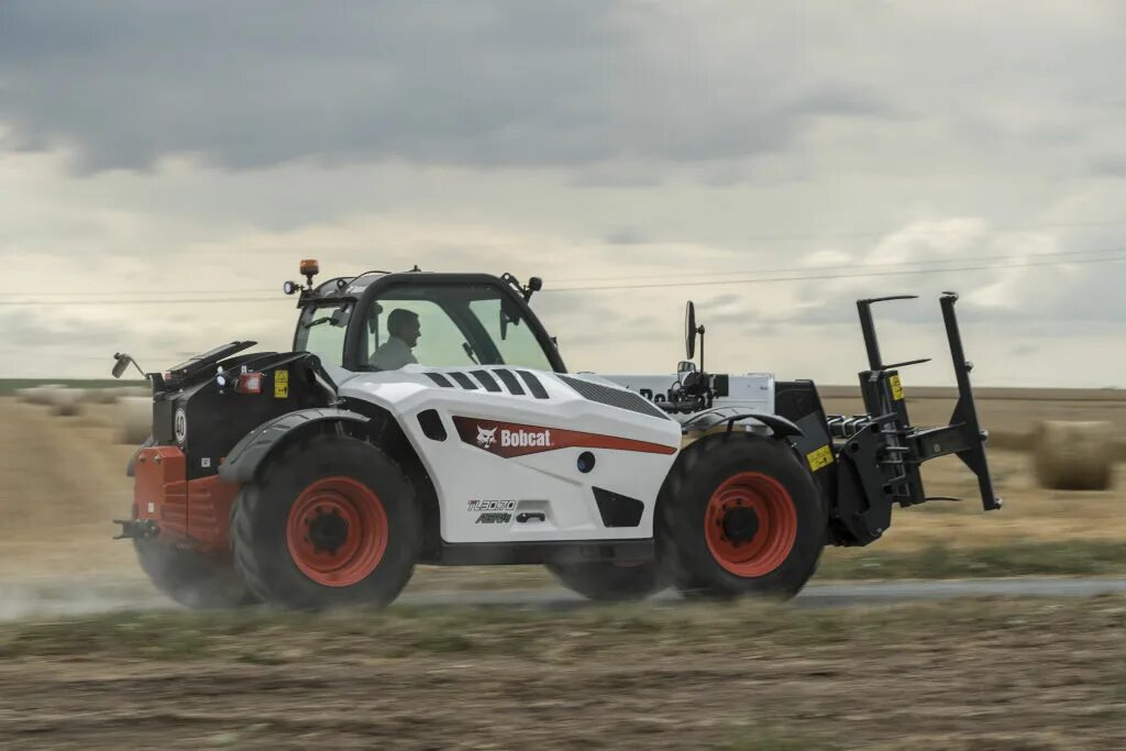 Телескопический погрузчик Bobcat TL30.70. Bobcat TL30.70 Agri. Погрузчик Bobcat, TL30.70HB. Бобкэт tl3070 телескопический погрузчик. Телескопический погрузчик bobcat