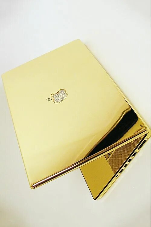 Компьютер gold. Золотой компьютер. Золотистый ноутбук. Золотой ноутбук Apple. Комп из золота.