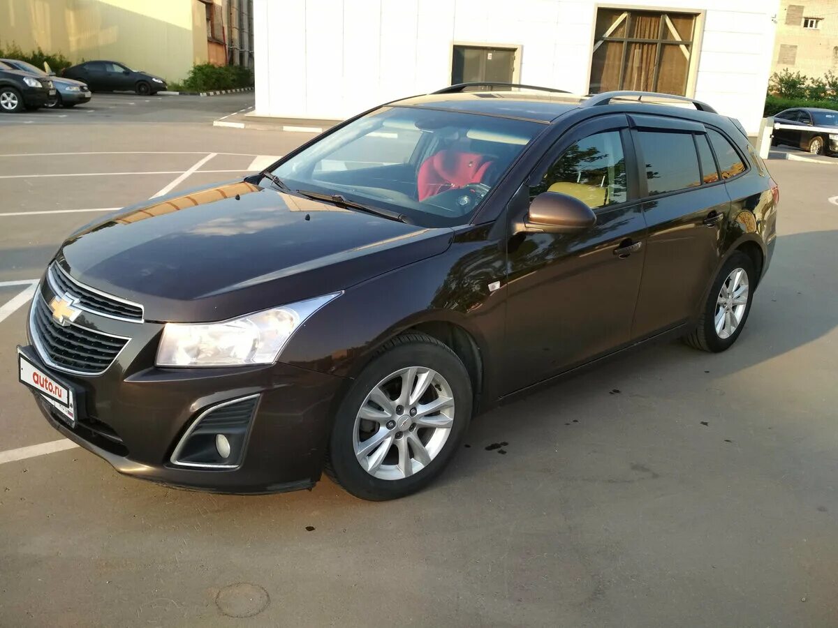 Круз универсал 1.8. Chevrolet Cruze 1 Рестайлинг универсал. Шевроле Круз универсал 2013 коричневый. Шевроле Круз универсал 1.8 автомат 2013. Шевроле Круз коричневый металлик 2014.