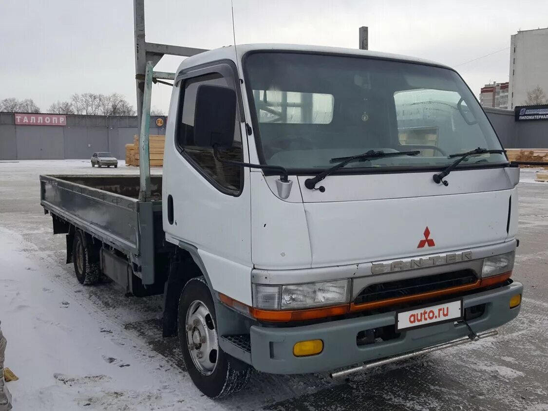 Mitsubishi бортовой. Mitsubishi Fuso Canter 1995. Митсубиси Кантер 1995г. Мицубиси Фусо 1995. Мицубиси Фусо Кантер 1995.