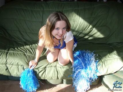 Kitty teases in the bed and shows her cute young body wearing cheerleader u...