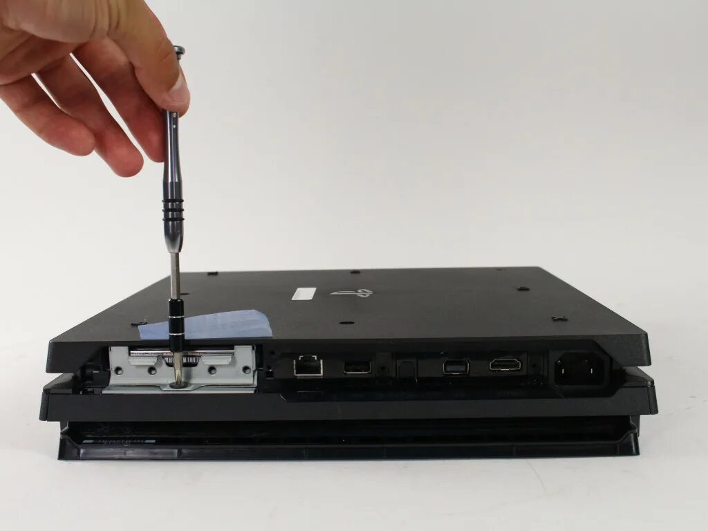 Как вытащить диск. Hdd ps4 pro. ps4 pro ifixit. playstation 4 pro hard drive. жесткий диск для playstation 4.