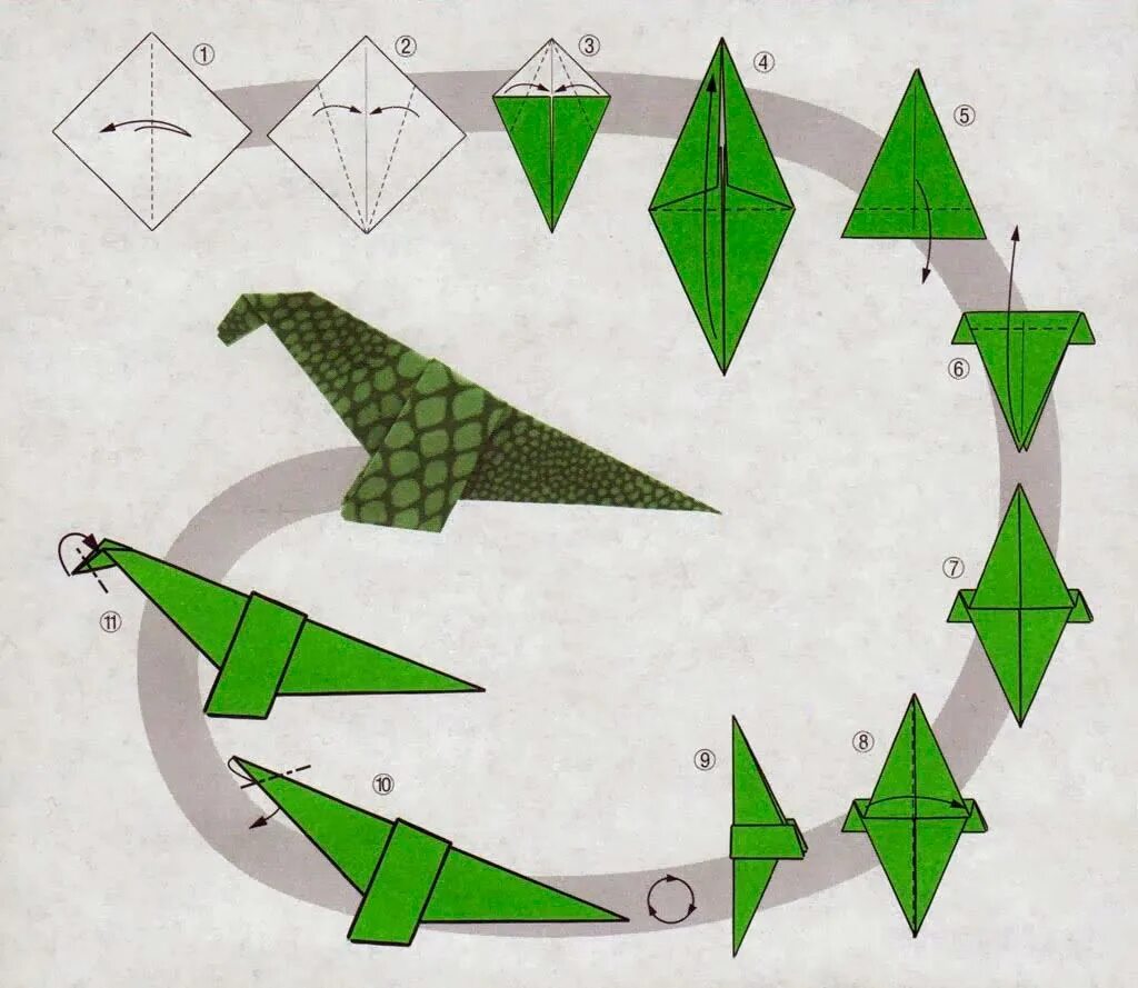 Драконы из бумаги поэтапно. Оригами из бумаги Динозаврик для детей. Оригами из бумаги для детей динозавры схемы. Динозаврик из бумаги оригами дракон. Динозаврик оригами схема.
