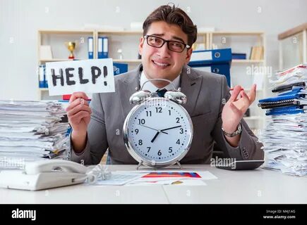 Businessman missing deadlines due to excessive work Stock Photo - Alamy.