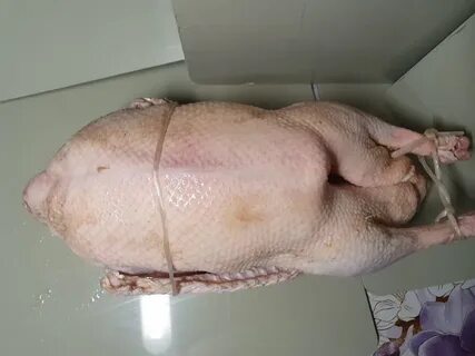 Тушка гуся весит