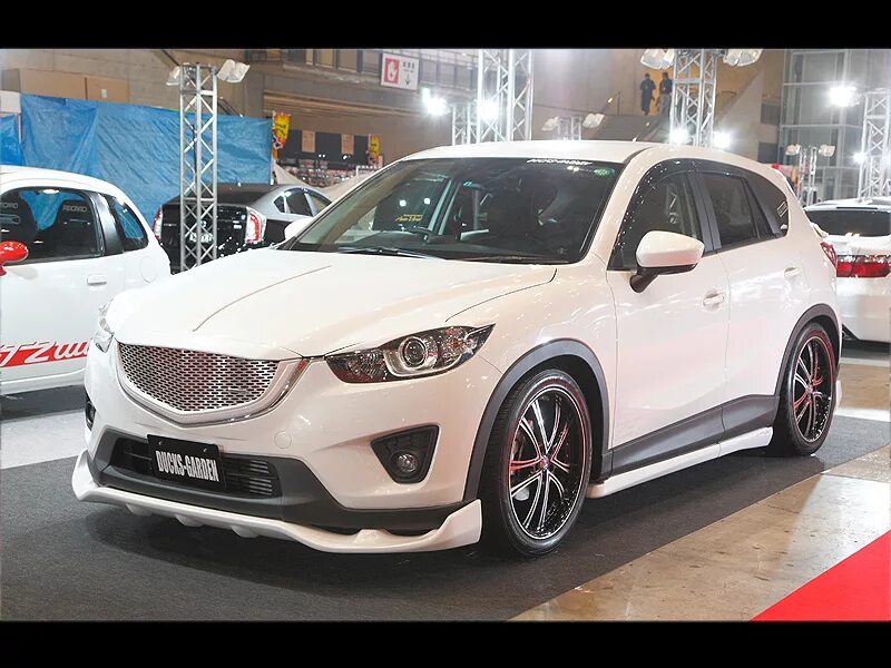 Тюнинг сх 5. Mazda CX 5 Tuning. Mazda CX 5 2015 Tuning. Обвес на мазду СХ 5. Mazda CX-5 белая обвес.