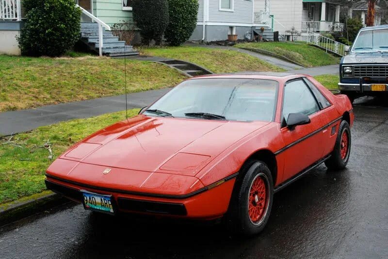 Понтиак фиеро. Pontiac fiero gt 1985. Pontiac fiero gt 1985. Портативная аудиосистема bq pbs1001 черный. Понтиак фиеро 1984.