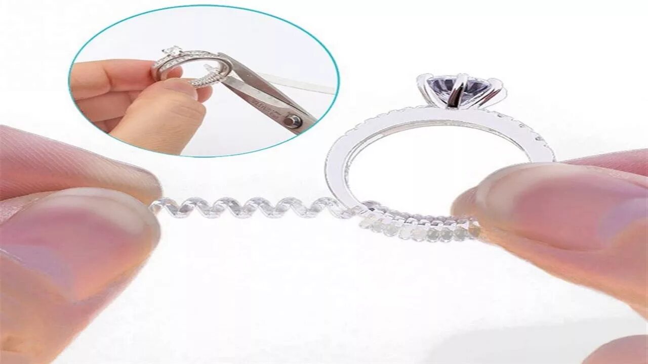 Уменьшение размера кольца с камнем. Золотое кольцо в кольце для уменьшения размера. Кольцо на силиконовой нити. Силиконовая подкладка для кольца. Расширить золотое кольцо