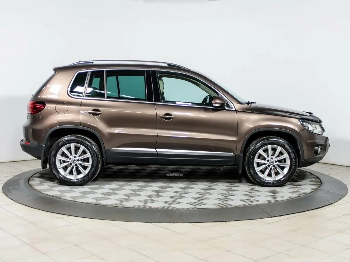 Volkswagen tiguan 2014. Tiguan 2014. Фольксваген Тигуан 2014. Тигуан коричневый 2014. Фольксваген Тигуан 2014 2.0.