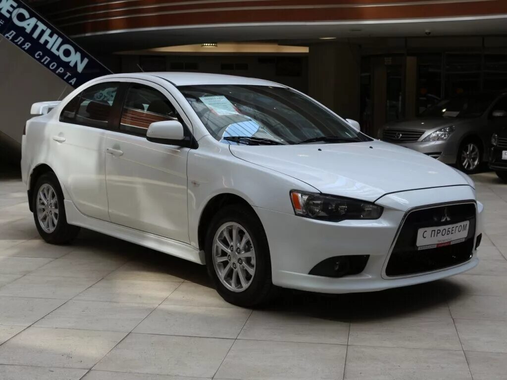 Mitsubishi lancer 2012. Mitsubishi Lancer x Рестайлинг 2012. Mitsubishi Lancer x 2012. Лансер 10 1.6. Lancer x 1.6.