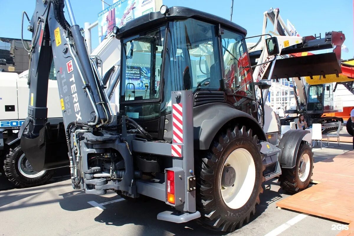 Экскаватор погрузчик 825. Экскаватор-погрузчик Terex 970. Экскаватор-погрузчик Terex TLB 825. Погрузчик Терекс 970. Трактор погрузчик Terex 970.