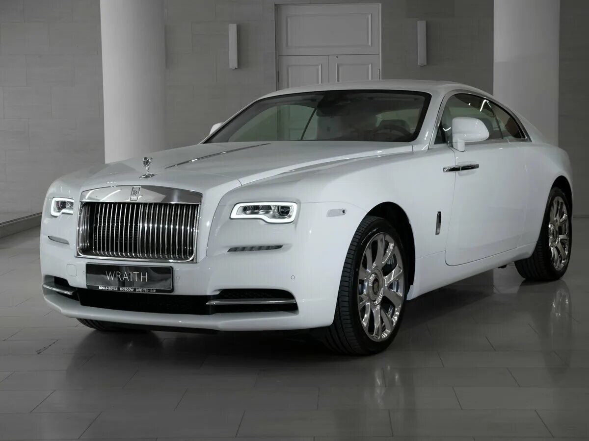 Белый роллс ройс. Rolls Royce Wraith 2022. Rolls Royce Wraith 2020 белый. Роллс Ройс купе 2022. Rolls Royce Coupe 2023.