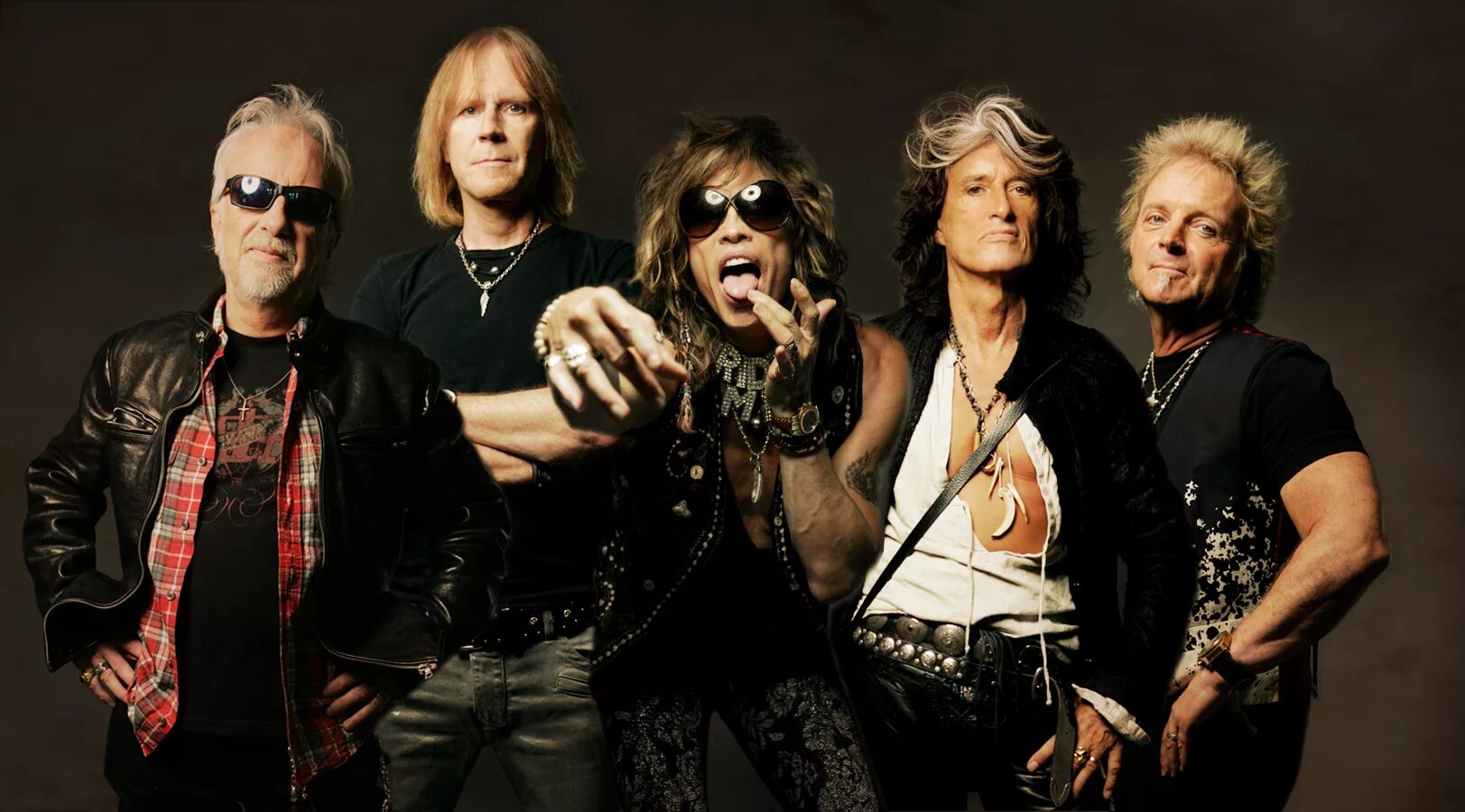 Зарубежные группы за россию. Группа Aerosmith. Аэросмит фото группы. Рок музыкант аэросмит. Aerosmith 1991.