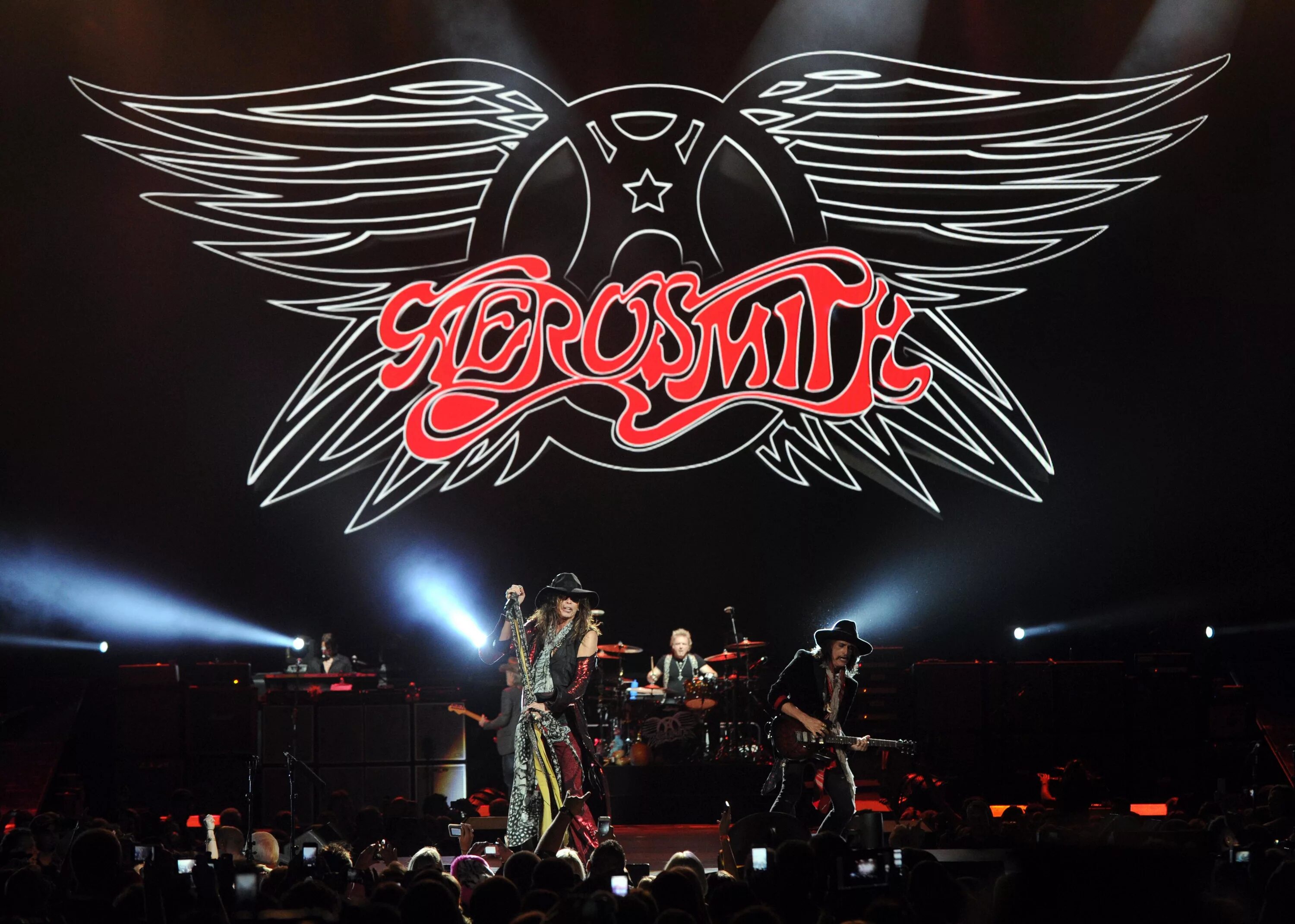 Жесткий рок слушать. Aerosmith. Группа Aerosmith концерт. Торба Aerosmith. Aerosmith обои.