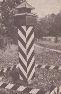 Памятник в виде граненого столба