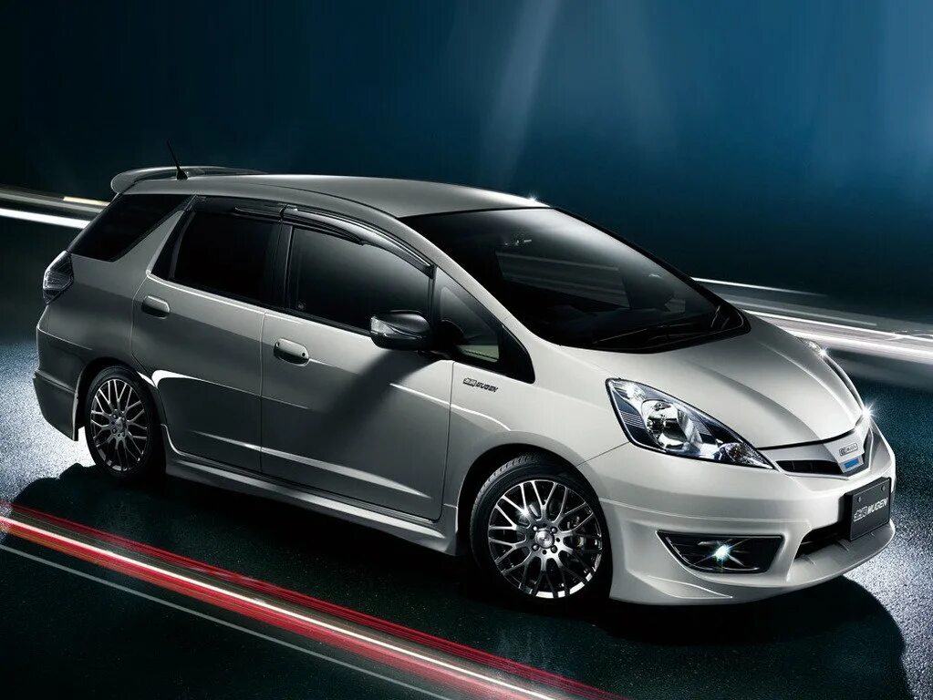 Фит шаттл 2011 год. Honda Fit Shuttle. Honda Fit Shuttle Hybrid 2011. Honda Fit Shuttle Hybrid. Honda Fit Shuttle Hybrid 2012.