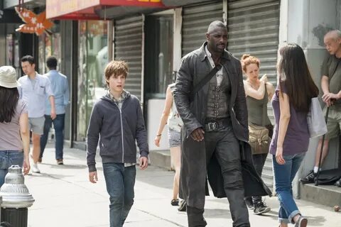 Idris Elba and Tom Taylor in The Dark Tower (2017) .