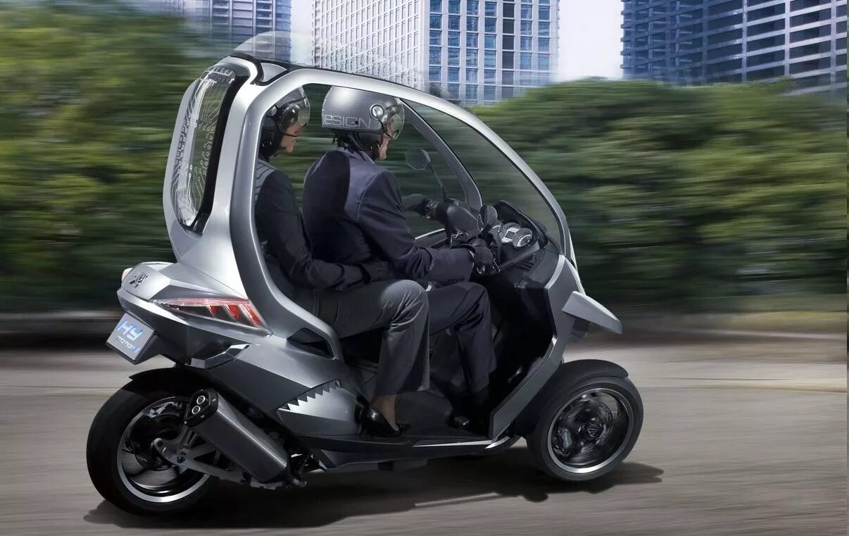 Трицикл двухместный бензиновый. Peugeot hymotion3. Скутер BMW c1. Трициклы BMW c1. Скутер Пежо на 3 колесах.