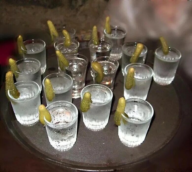 Утро после 23. Выпивать и закусывать.... Много рюмок на столе.
