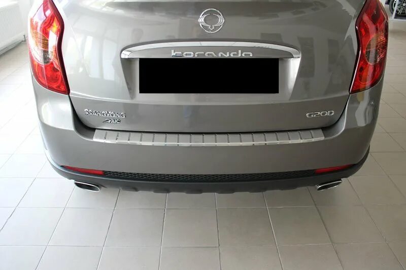Задний бампер саньенг актион. Накладка заднего бампера ssangyong actyon new. накладки бампера ssangyong action. накладка на бампер ссангйонг актион. задняя накладка на бампер ссангйонг актион.