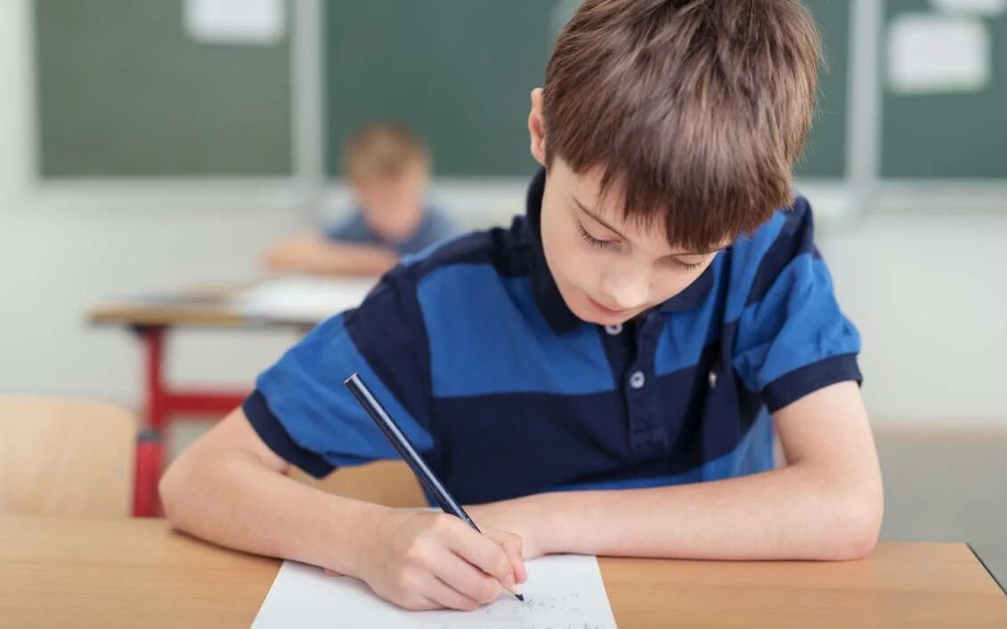 The boys are students. Школьник пишет. Ученик пишет. Школьники Сток. Ученики пишут тест.