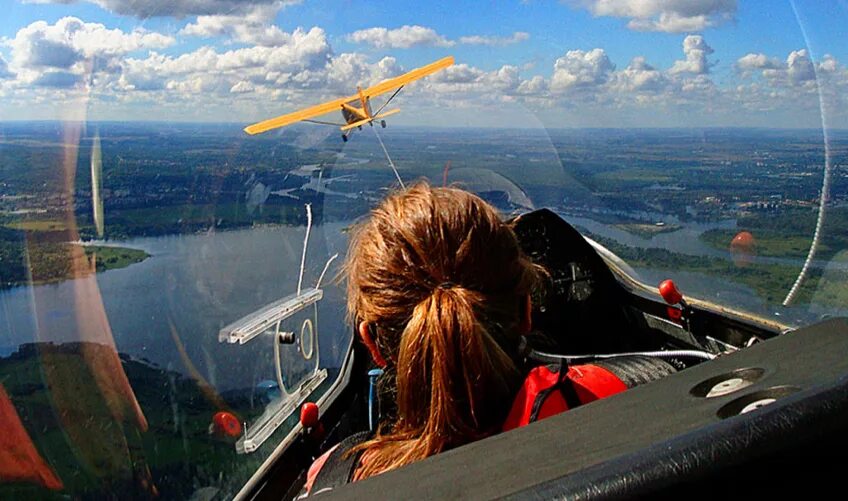 Flying lesson. Fly a Plain. Fly a plane Spotlight. Soaring man. Flying Lesson in an Airplane.