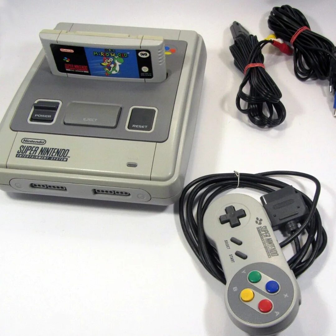 Super famicom. Консоль Nintendo Snes. Nintendo super Famicom. Super Nintendo Pal. Super Famicom Console.