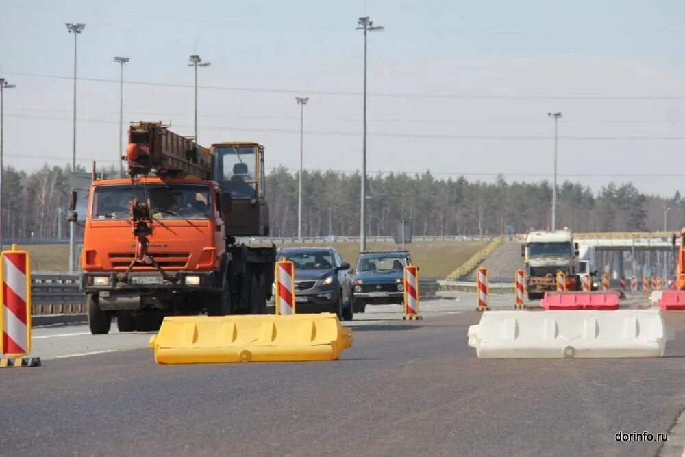 Трасса м5 ремонт дороги 2022. Полосы на Киевском шоссе. Дорога новий посёлка. Расширение Киевского шоссе 51 км.