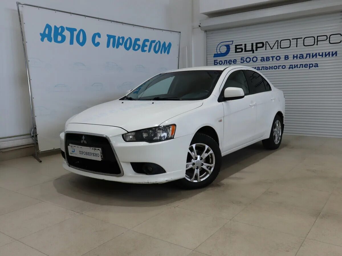 Митсубиси купить в нижнем новгороде. Mitsubishi Lancer 10 Рестайлинг цвет w37. Митсубиси Волгоград. Белая механика. Сколько стоит Mitsubishi Motors белого цвета.