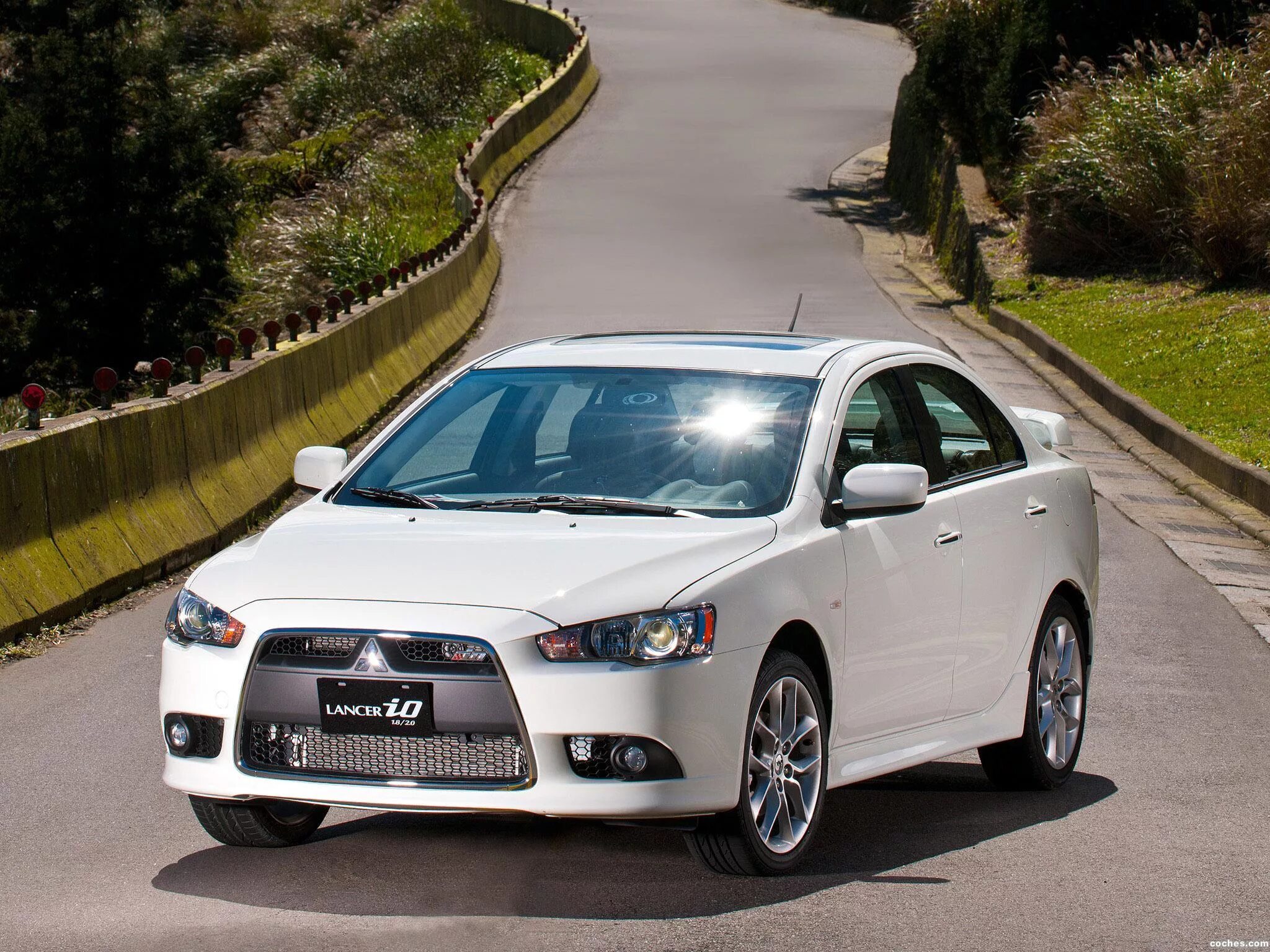 Mitsubishi auto ru. Mitsubishi Lancer 10. Мицубиси ланцер 10. Митсубиси Лансер 10 2012. Митсубиси Лансер 2012.