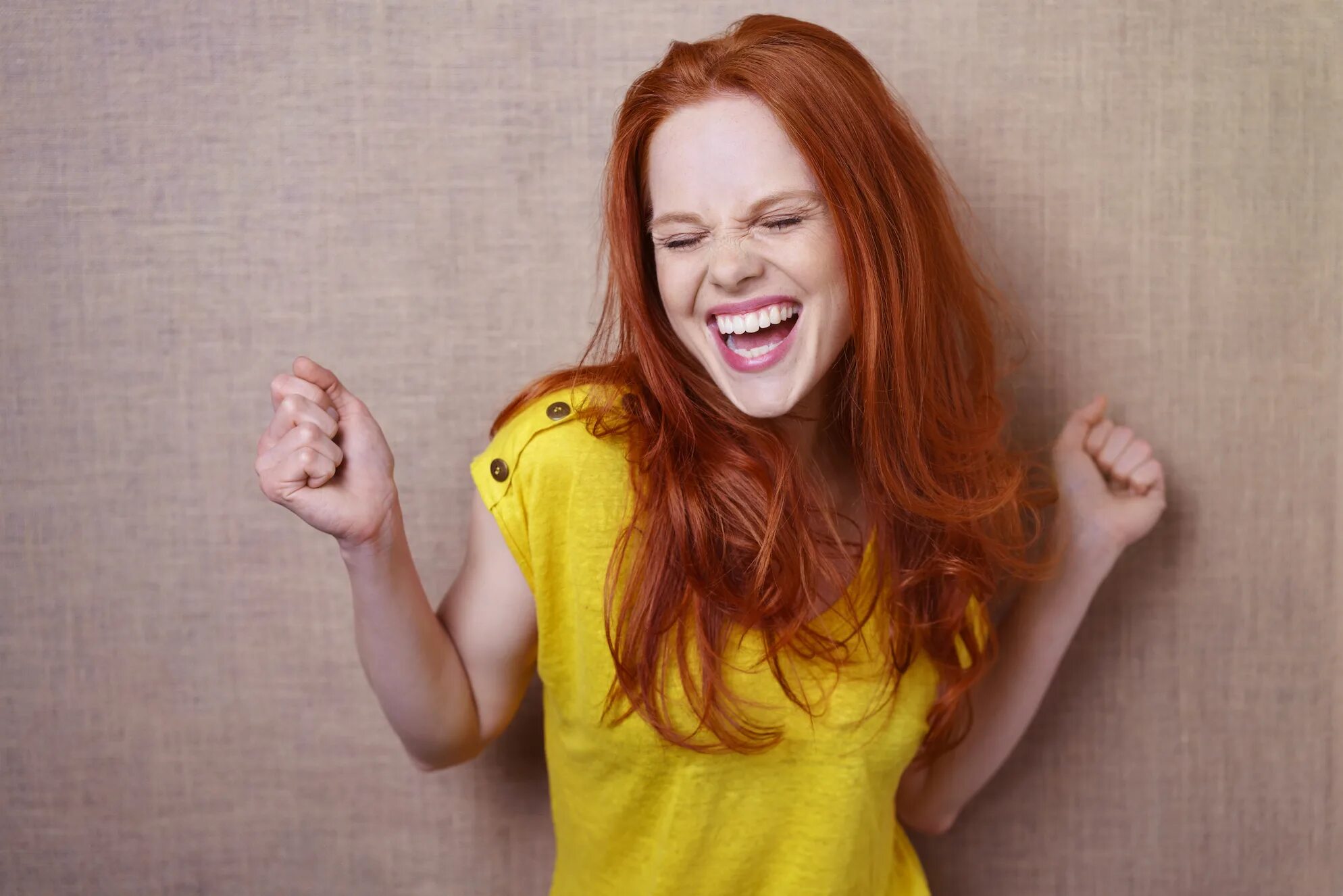 Girls laughing loudly. Red head woman laugh.