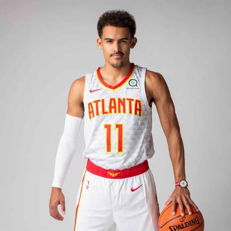 Trae young баскетболист. Трей Янн. Trae young баскетболист рост. Баскетболист young 11 номер.