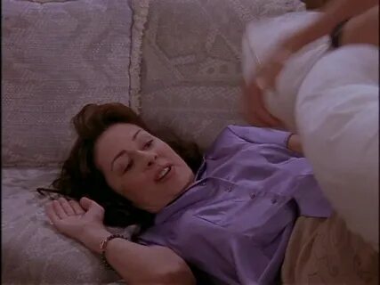 Patricia Heaton - purple satin blouse.