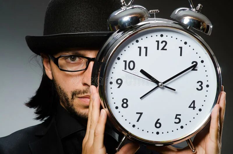 Future large clock man. Часы люди в черном. фото клок мена. man with clock. главный клок мен фото.