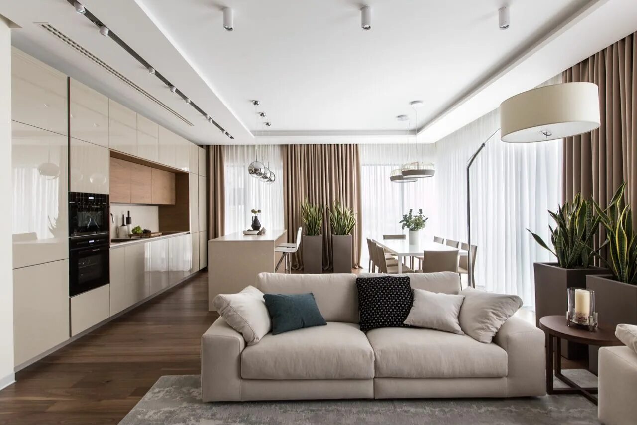 Светлая гостиная с яркими акцентами. Современный стиль в интерьере. Интерьер квартиры в современном стиле реальные. Кухня гостиная в стиле модерн 20кв м. Современный стиль в интерьере.