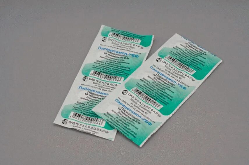 Пачка парацетамола. Лекарства в бумажной упаковке. Препараты с парацетамолом. Парацетамол таблетки.