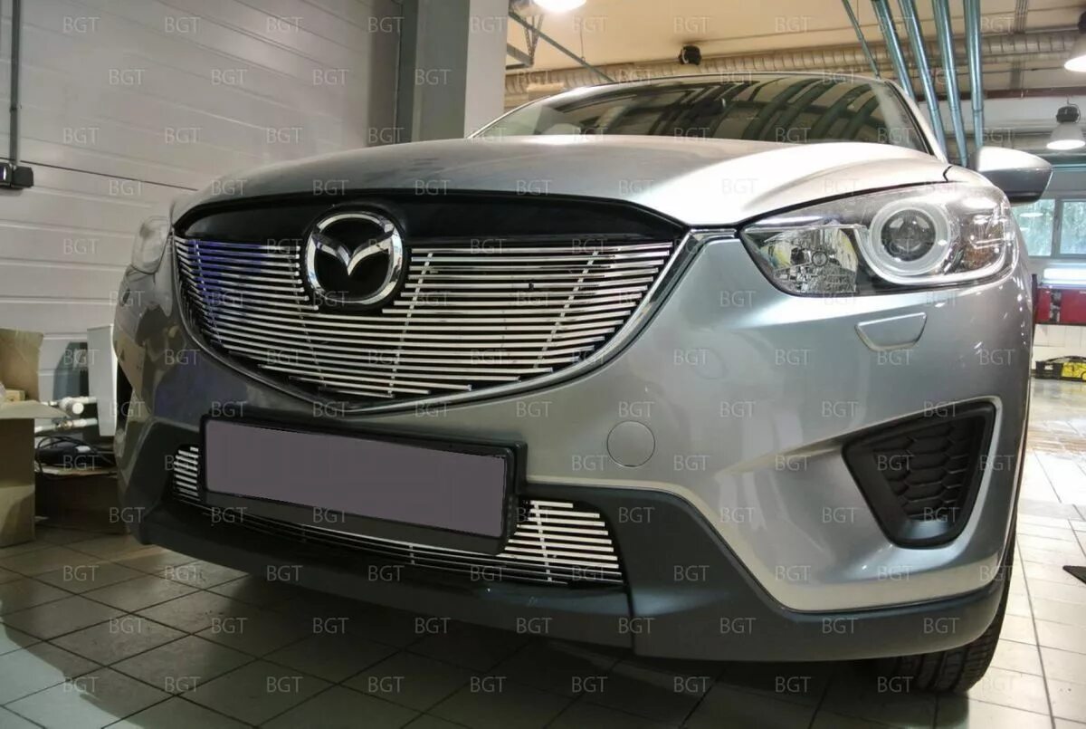 Решетки мазда сх5. Решетка радиатора Mazda cx5 2022. Решётка Мазда CX 5. Mazda cx5 (2012-2015) решетка радиатора. Решетка Mazda CX-5.