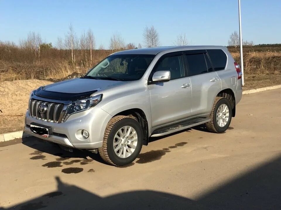 Ленд крузер прадо 2015 год. Toyota Land Cruiser Prado 2015. Ленд Крузер Прадо 2015. Тойота Прадо 150 2015. Тойота ленд Крузер Прадо 2015.