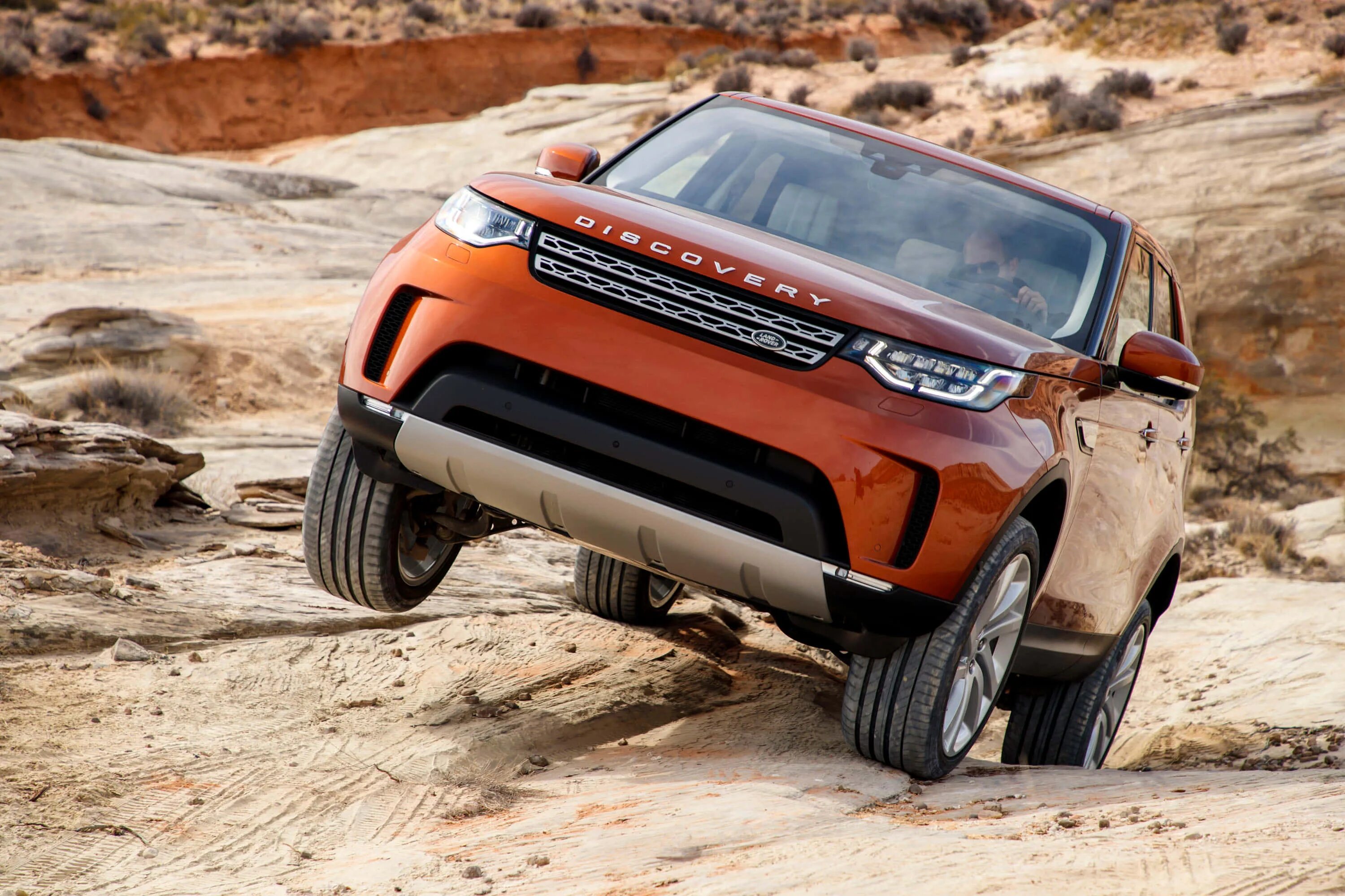Land Rover Discovery новый. Land Rover Discovery 5. Ленд Ровер Дискавери оранжевый. Land Rover Discovery 5 Namib Orange. Тест дискавери