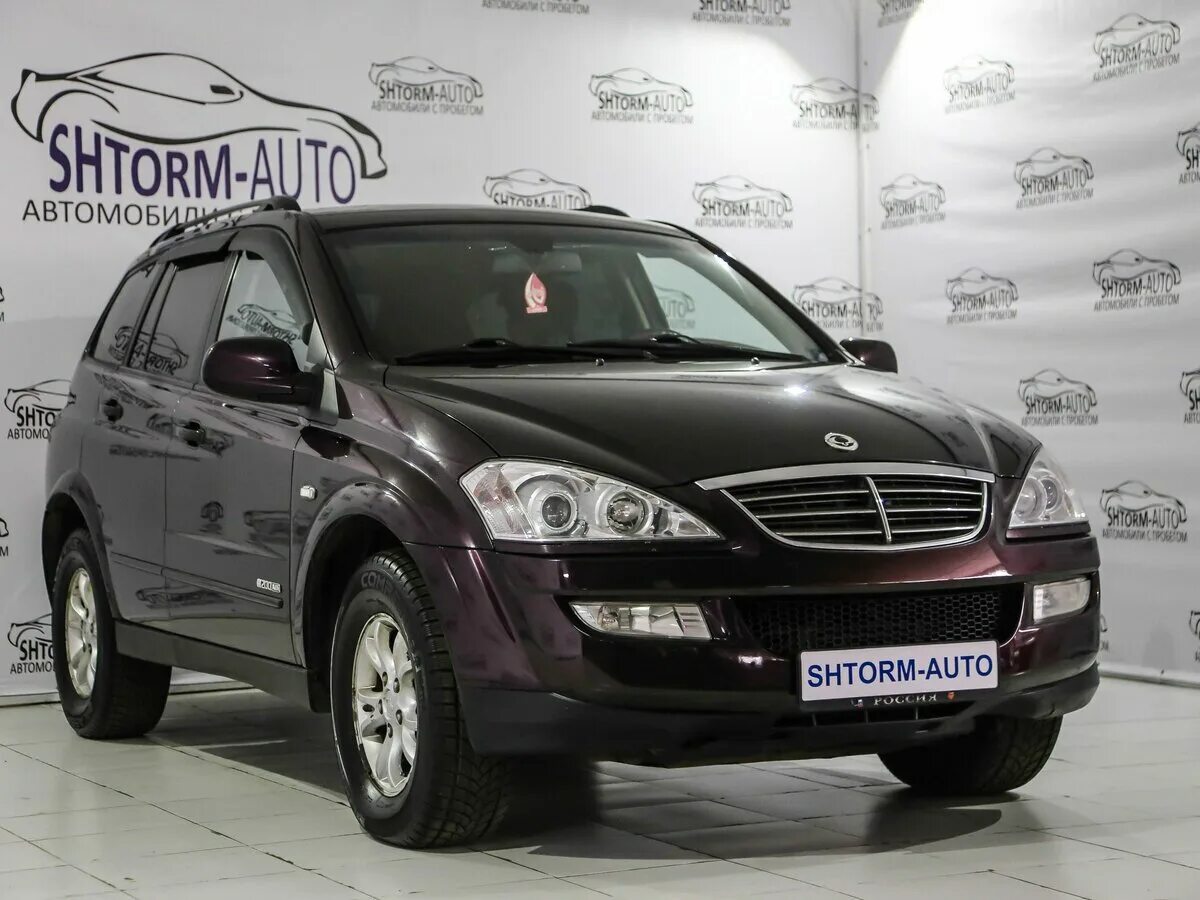 Кайрон Санг Йонг 2009. SSANGYONG Kyron Sport 2009. Саньенг Кайрон салон 2009 года. Саньенг Кайрон фиолетовый.