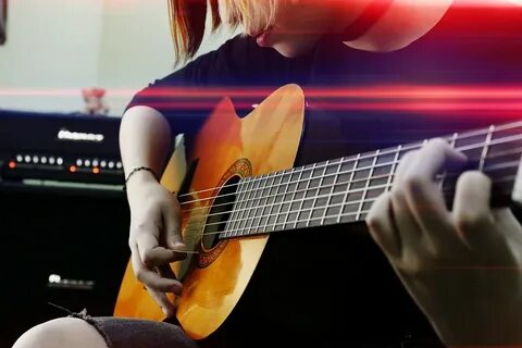 Учи ребенка играть на гитаре