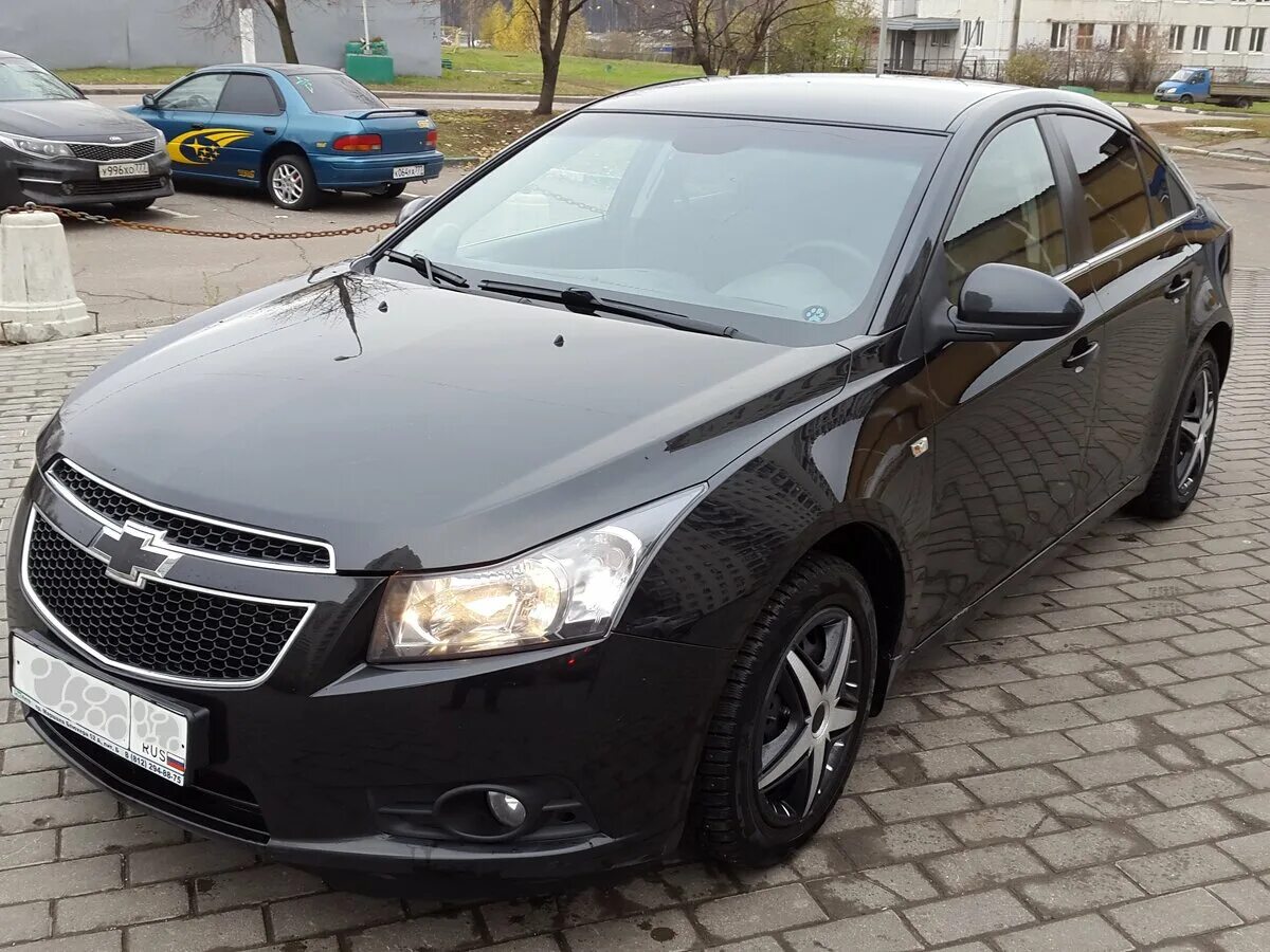 Шевроле круз 2010 купить. Chevrolet Cruze 2011 черный. Шевроле Круз седан черный 2013. Шевроле Круз седан 2010. Шевроле Круз седан черная 2011.