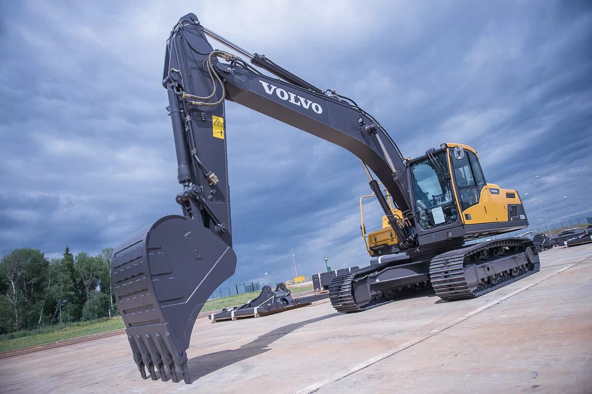 Volvo ec250. Volvo ec220dl. Вольво 210 экскаватор. Экскаватор гусеничный Volvo 210. Колесный экскаватор вольво