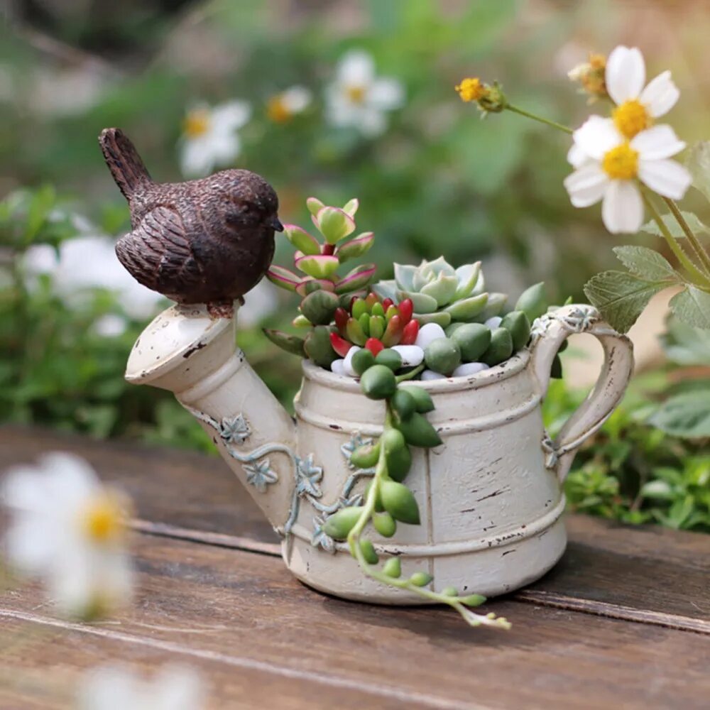 вьюн птичка. керамический горшочек птичка. красивые горшки для цветов для сада. птица в горшочке. синички и цветы.