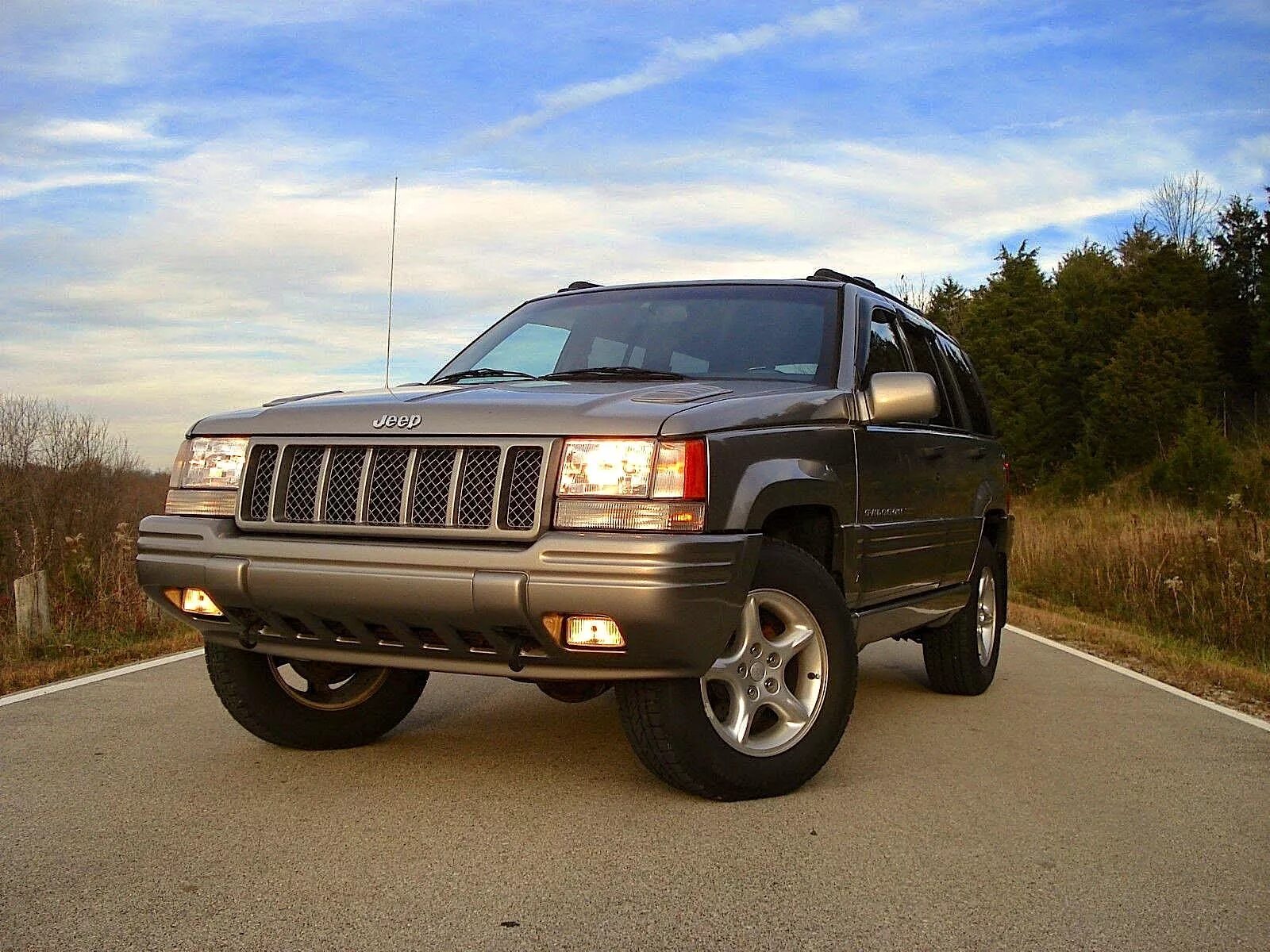 Джип гранд чероки zj купить. Jeep Grand Cherokee 1998 5.9. 1998 Jeep Grand Cherokee 5.9 Limited. Jeep Grand Cherokee 1998 5.2. Jeep Grand Cherokee ZJ 5.9.